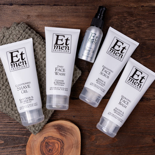 Collection of Et men Skincare products on a wooden surface