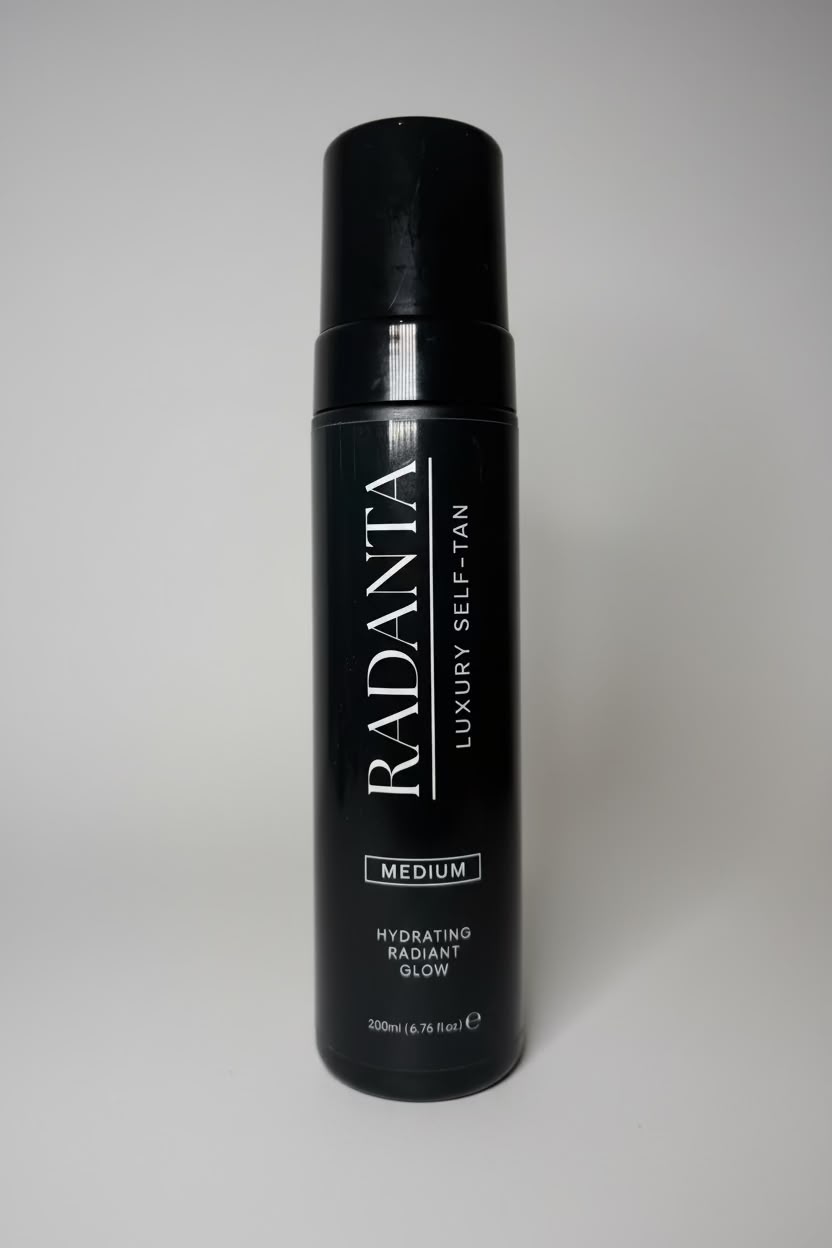 Medium tanning mousse bottle, black can with Radiant Glow label