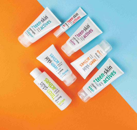 Collection of 'teen-skin actives' skincare products on a colorful background