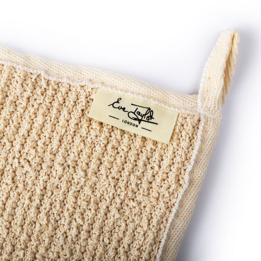 Exfoliating body mitt detail, cream textured knit with Love Lilly brand patch