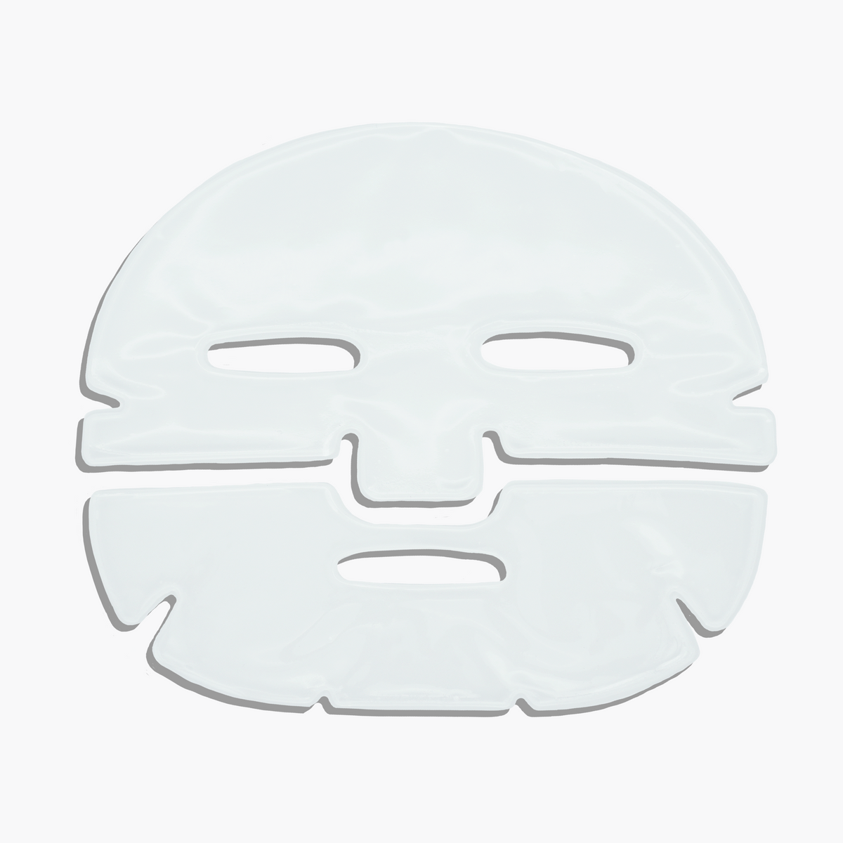 Hyaluronic face mask sheet with eye and mouth cutouts, translucent