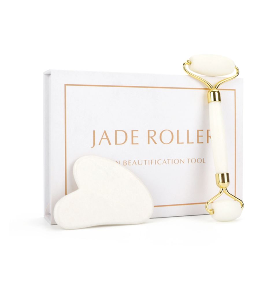 White jade roller and heart gua sha tool set with gold-tone handles