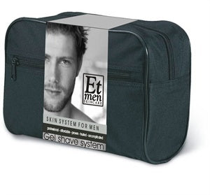 Black toiletry bag with a man's face and 'Et men' branding on a white background