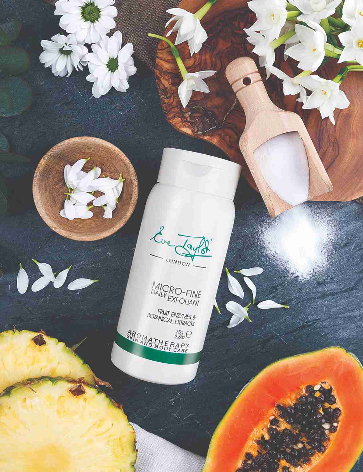 Exfoliant skincare product on a dark surface