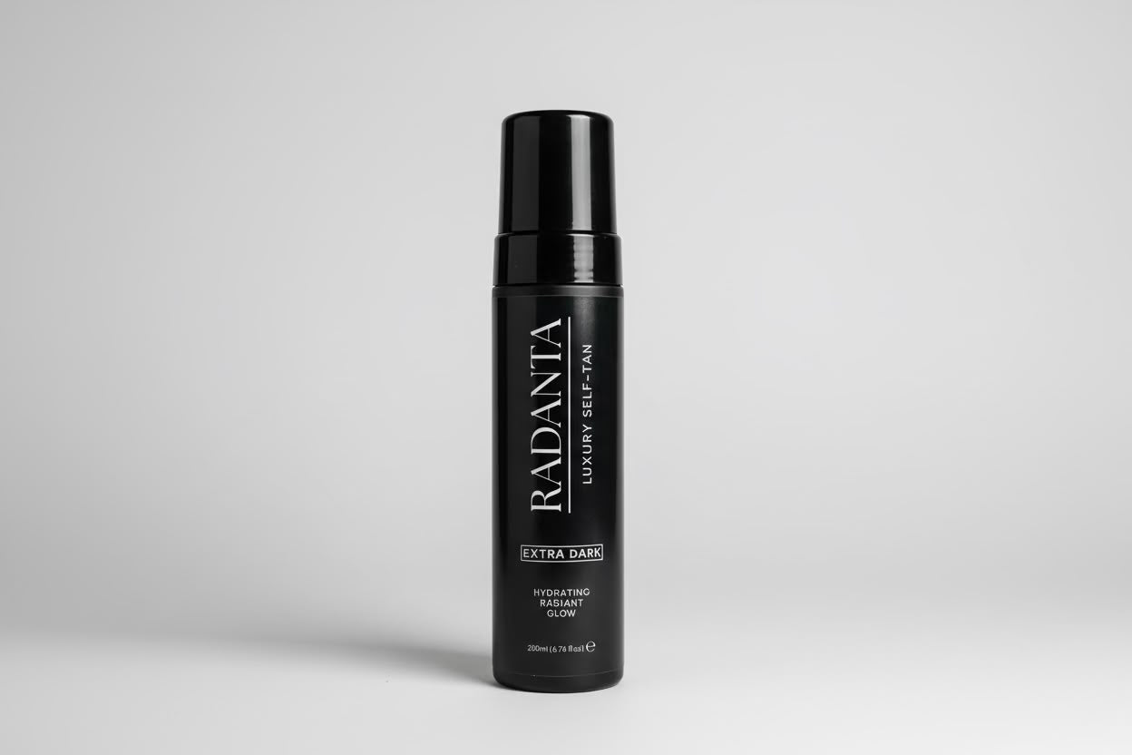 Extra dark tanning mousse bottle with black pump cap and vertical label
