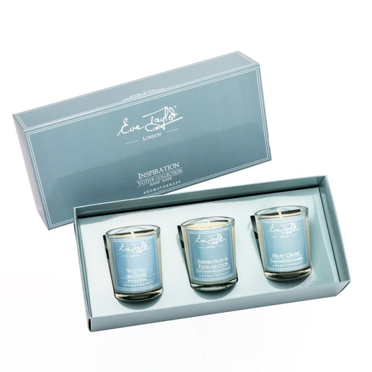 Votive candle set with three teal glass candles in presentation box