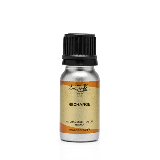 Amber essential oil bottle labeled recharge with black ribbed cap