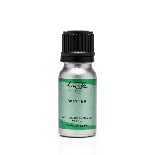 Winter diffuser blend essential oil bottle with black ribbed cap, green label